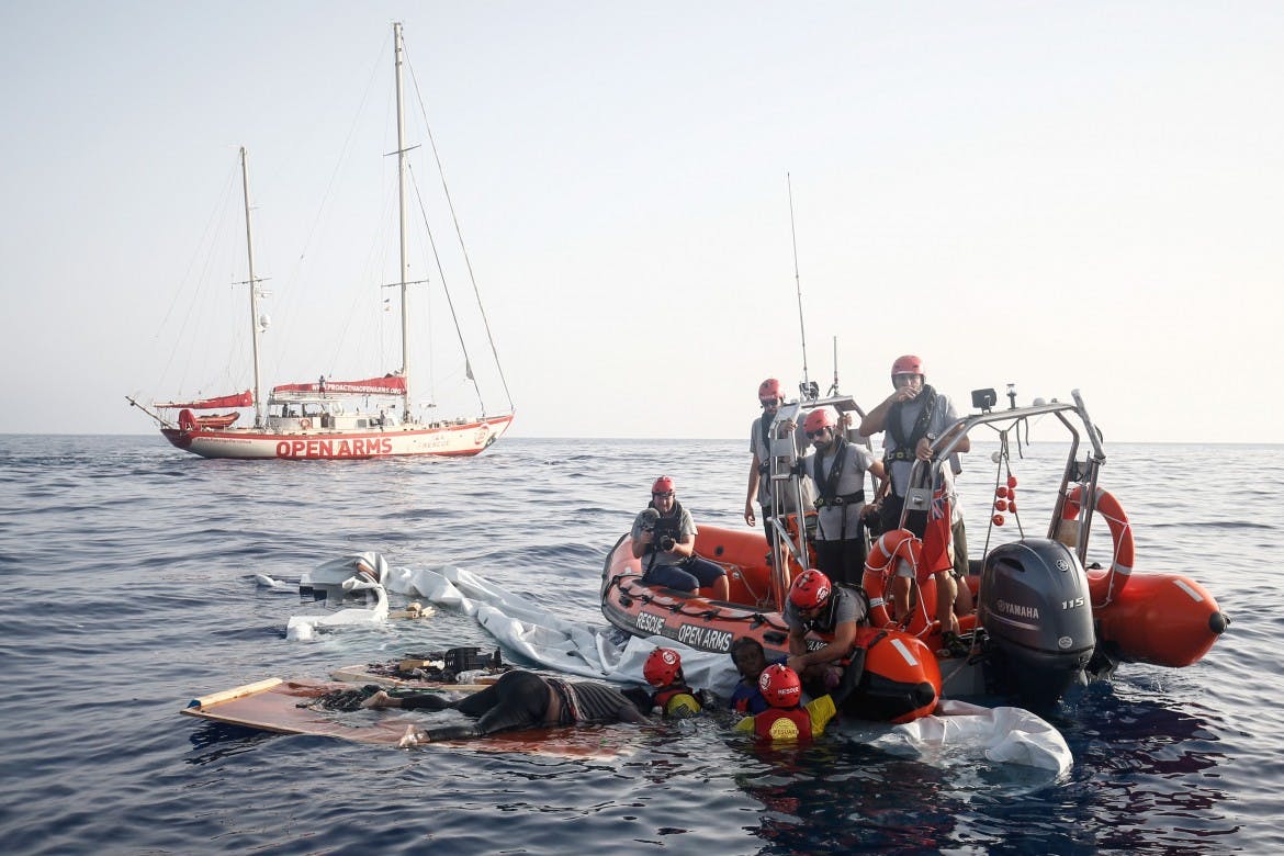 Libyans sank a migrant vessel with 2 women, 1 child still on board, NGO says