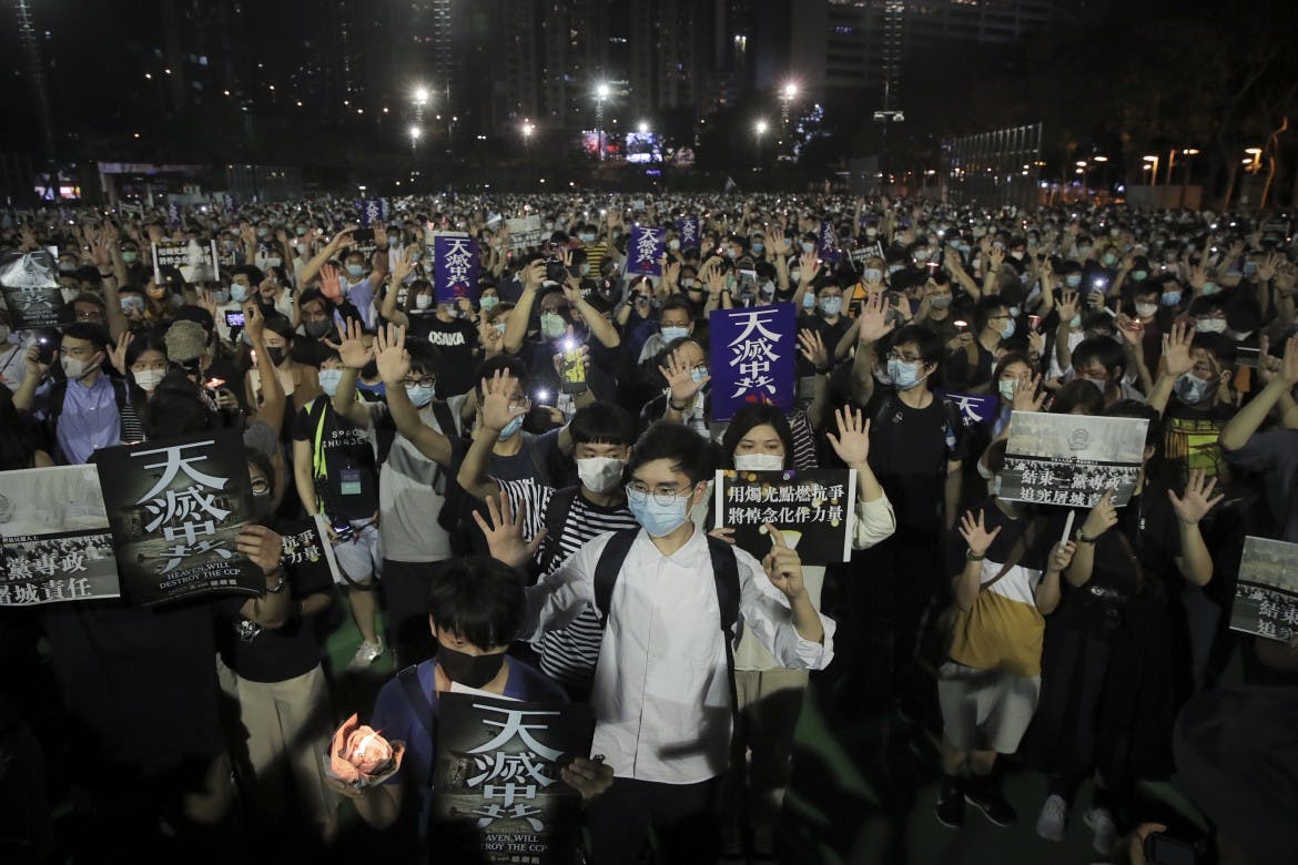 Despite ban, Hong Kong remembers Tiananmen massacre