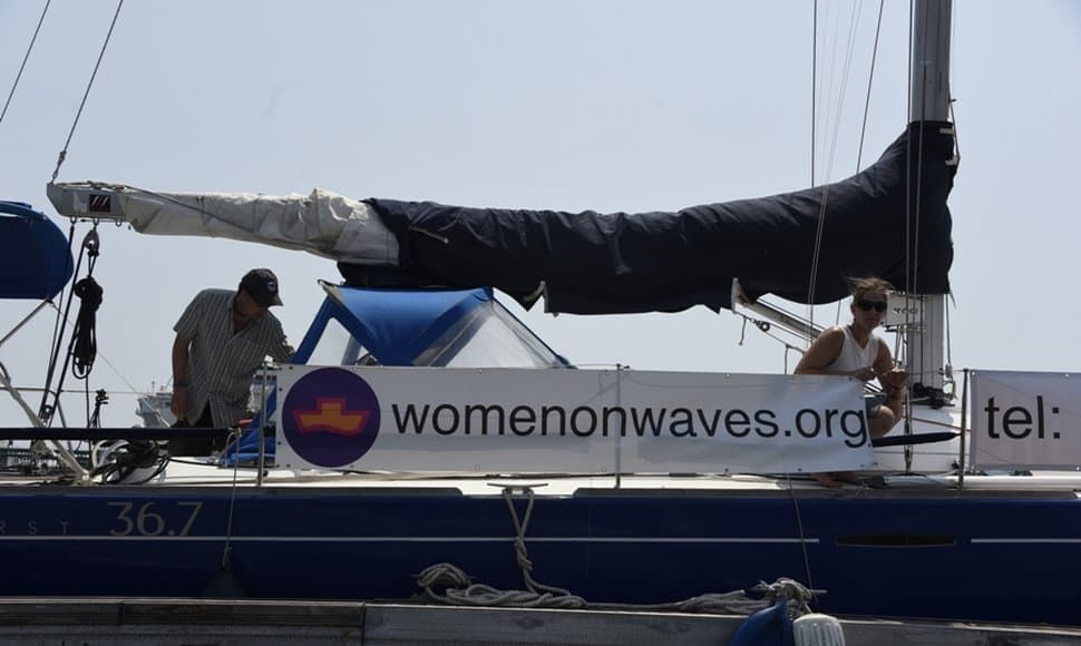 women on waves