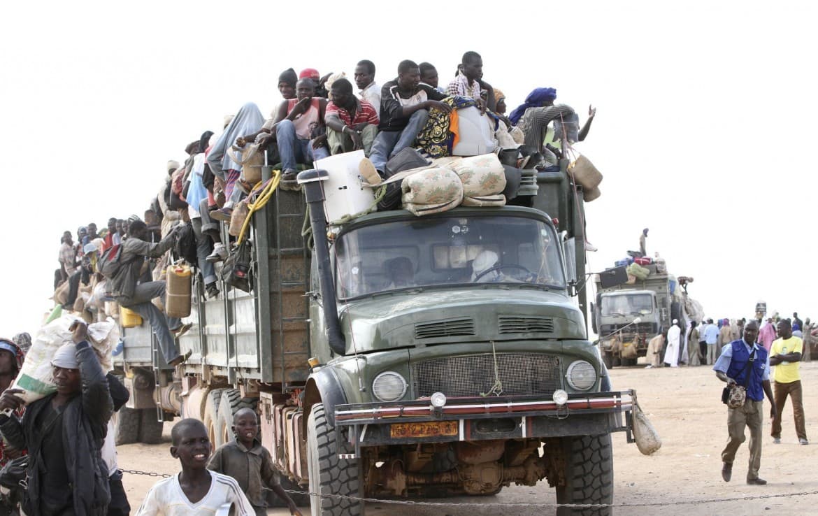 image of climate refugees in a truck