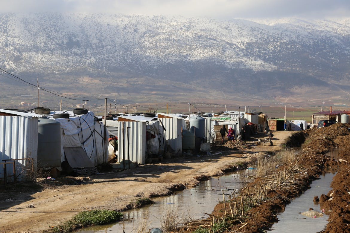 In Lebanon, rain and snow pounds the shacks of forgotten refugees