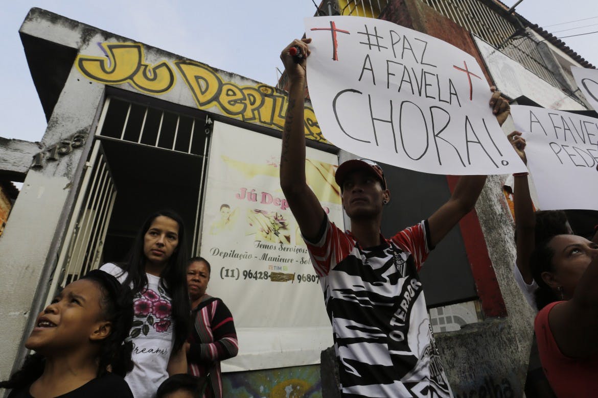 image of protesters in a favela