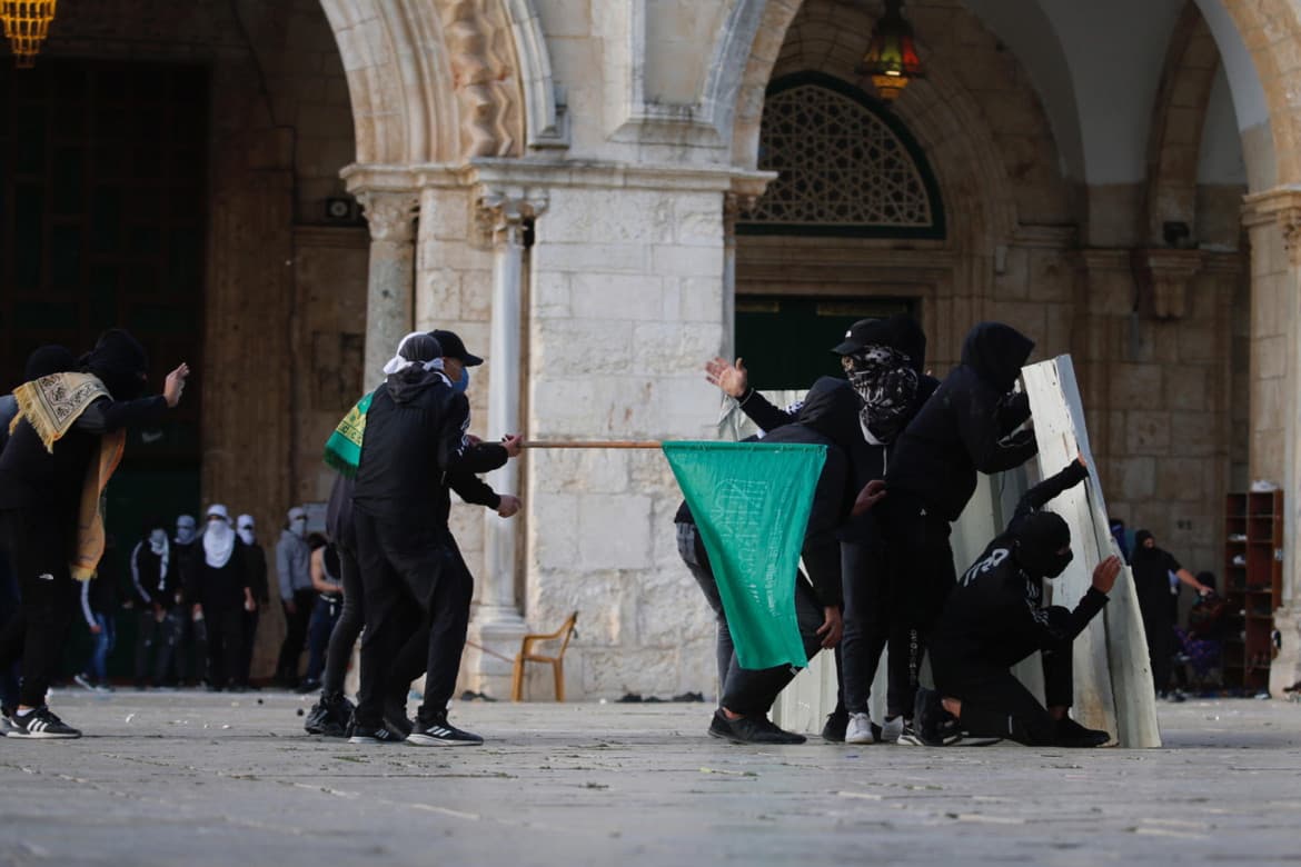 Drone over Al Aqsa, dozens of Palestinians injured in clashes with police