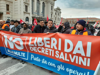 Workers march to Piazza Duomo in protest of the ‘Salvini decree’