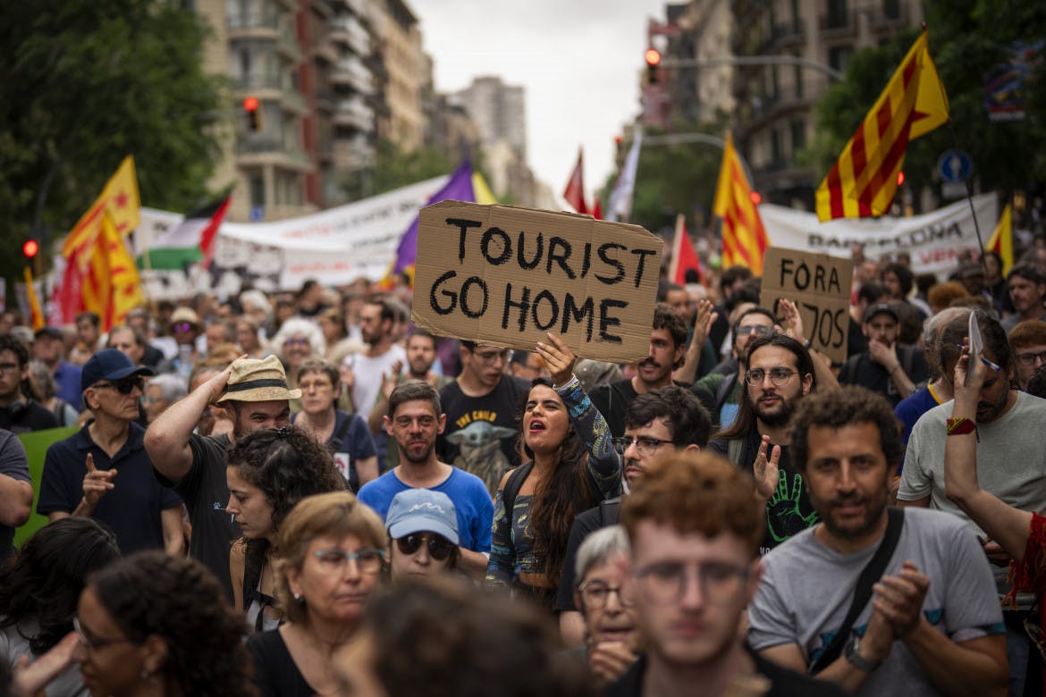 Barcelona takes aim at tourist housing, but tenants say the policy is misguided