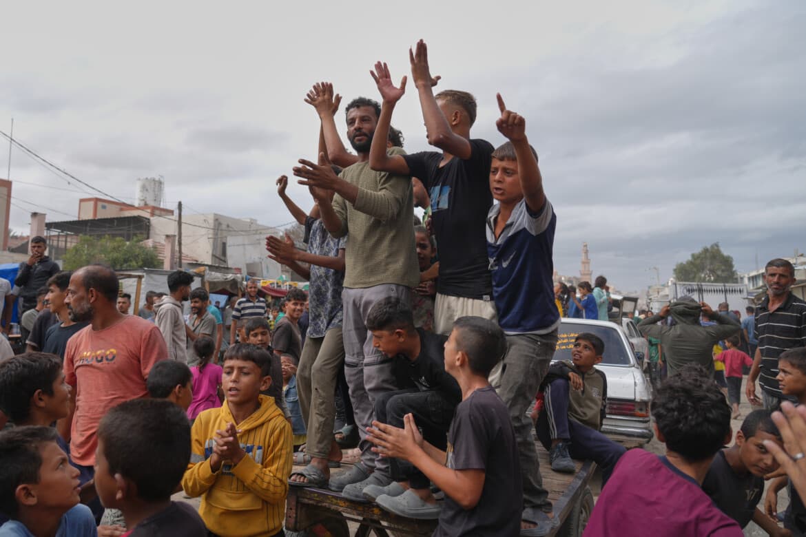 Gazans celebrate the ceasefire, but some killings continue