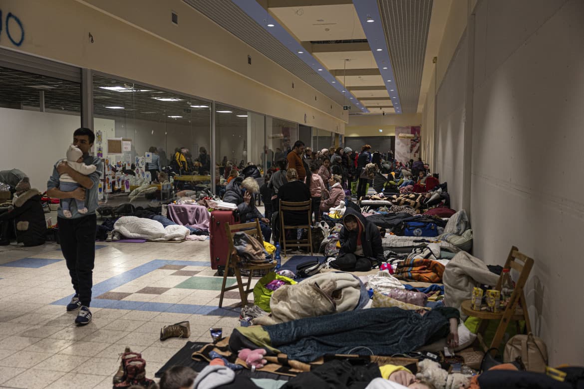 In Poland, a new health emergency as thousands are piled up at a supermarket