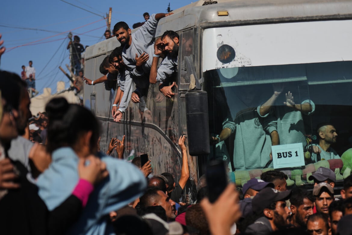 Prisoners return to a land destroyed, with cries of relief not joy
