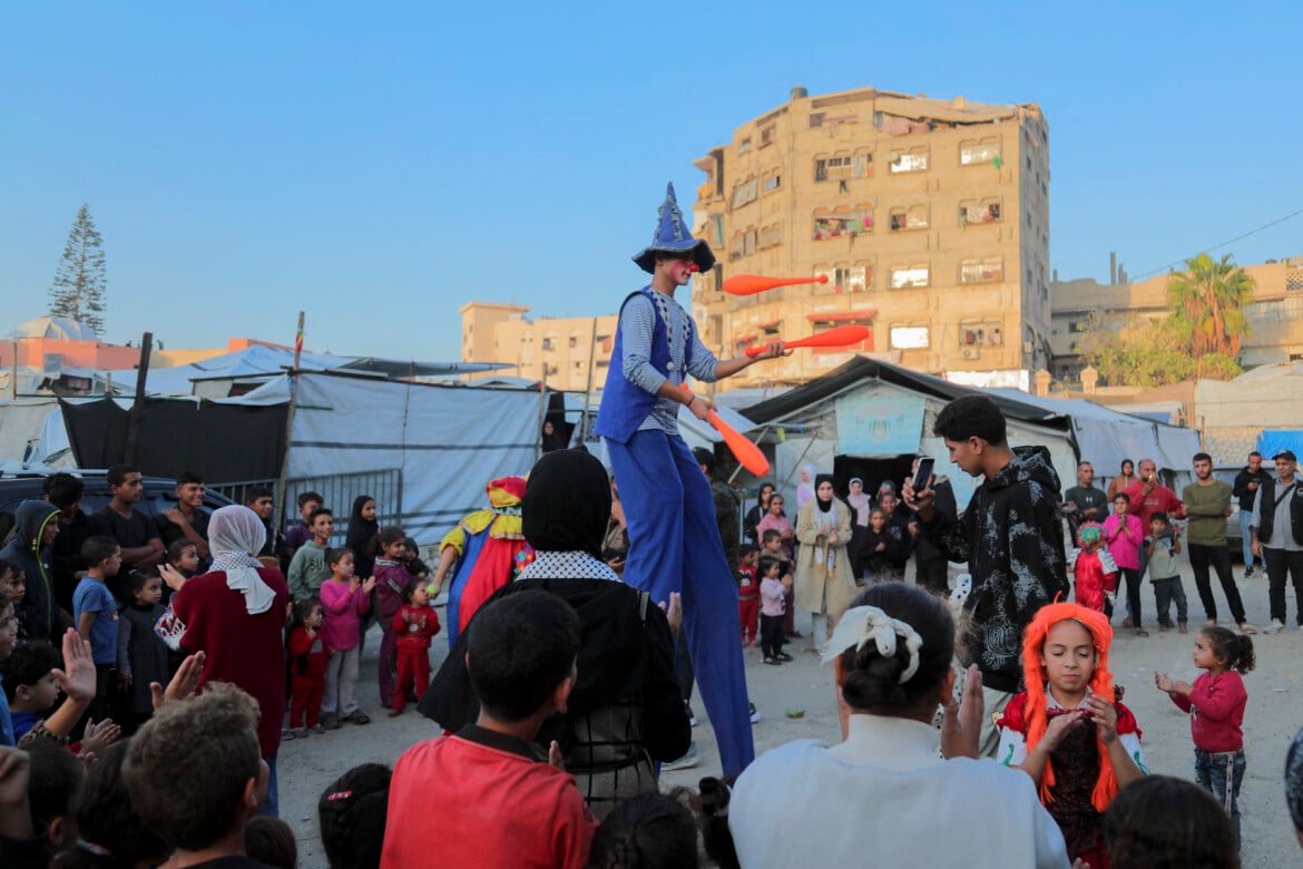 Rebuilding humanity with painting and laughter