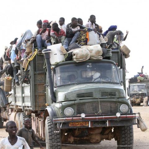 image of climate refugees in a truck